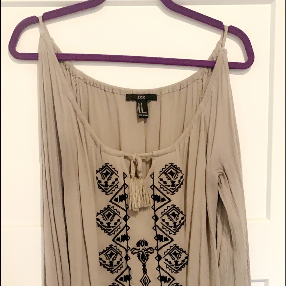 Tribal print, bell sleeve w/cut outs top!